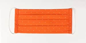 Faltenmaske: Orange weiße Punkte